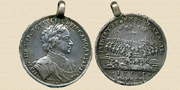 Medal awarded to soldiers for the Battle of Poltava. Medallists Solomon Gouin and Gottfried Haupt. 1709. Silver.