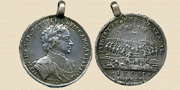 Silvermedalj, graverad av Solomon Gouin och Gottfried Haupt 1709, för soldater som deltagit i slaget vid Poltava den 28 juni 1709.